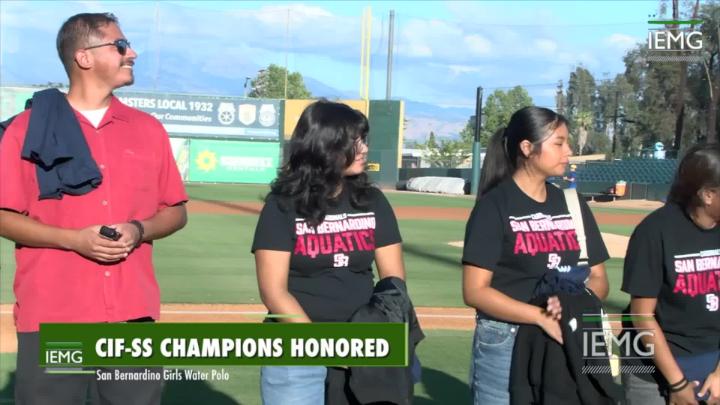 Waterpolo Team Being Recognized at 66ers Game