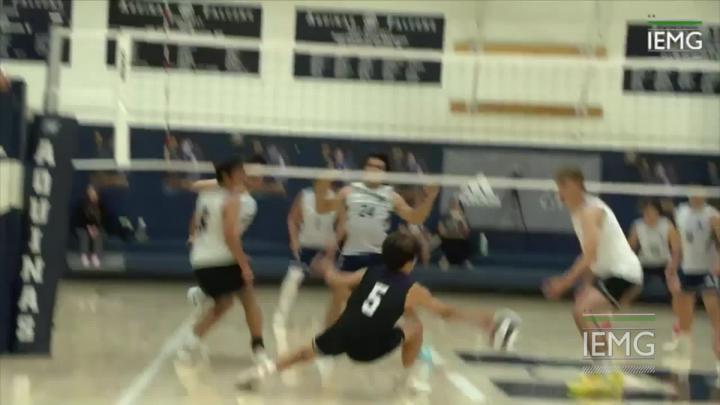 Volleyball Players Playing on Court